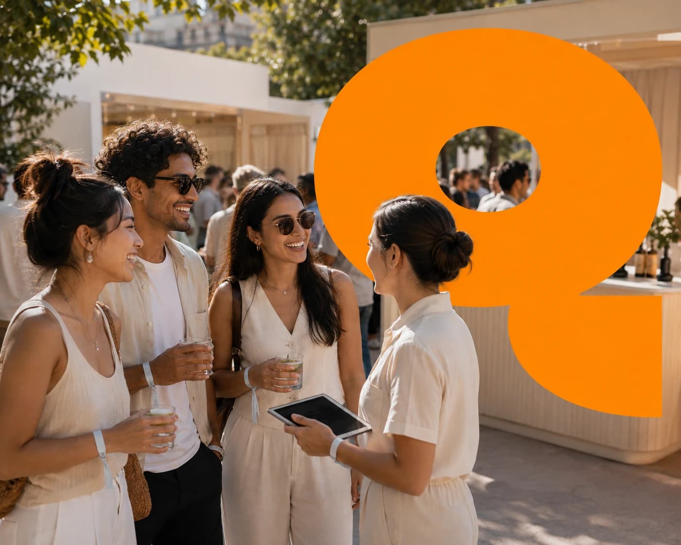Event staff checking in smiling guests with a tablet, next to a giant orange WaitQ Q